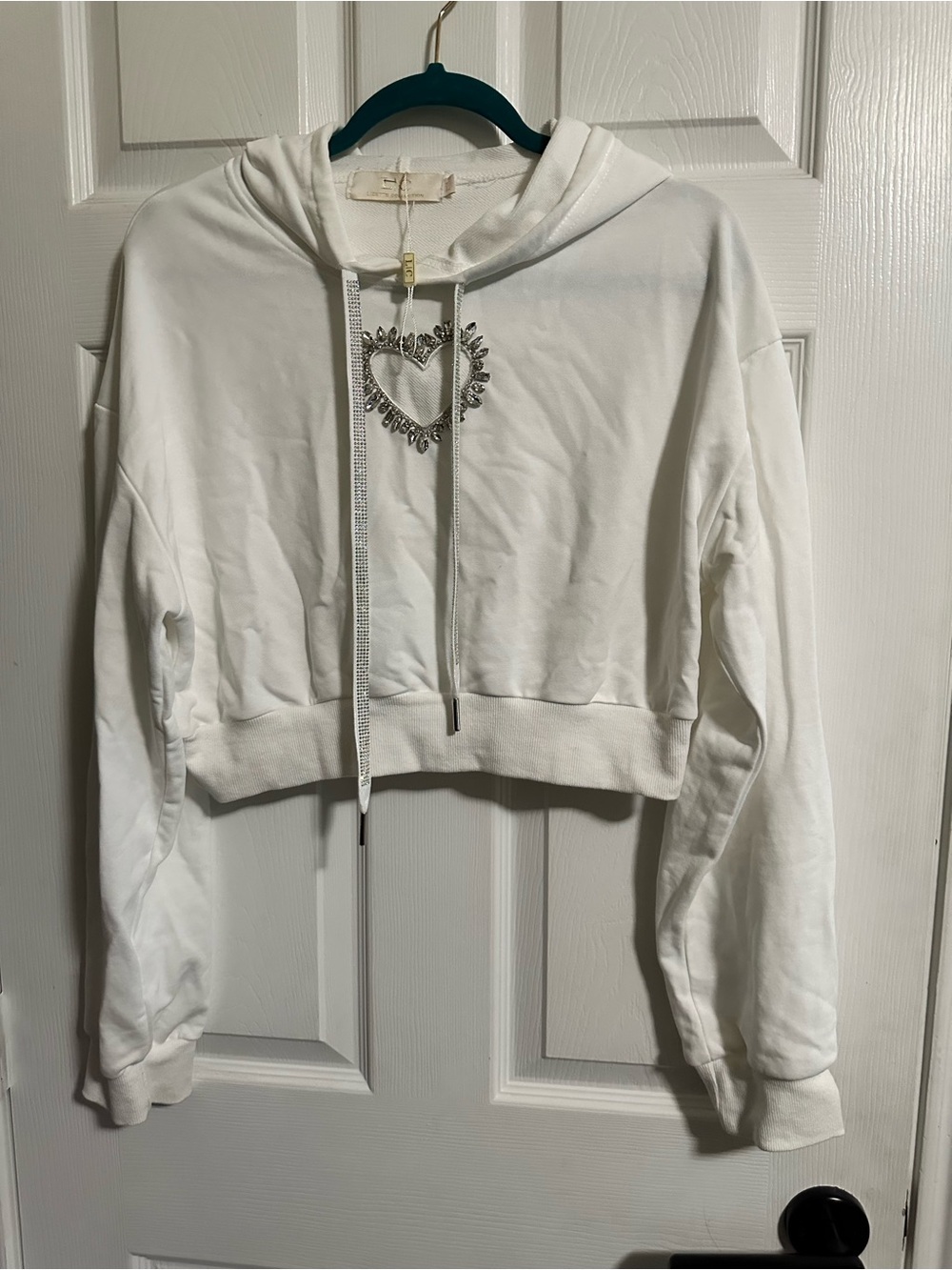 Lizette Collection Cropped White Hoodie with Heart Cutout Embellishment Large